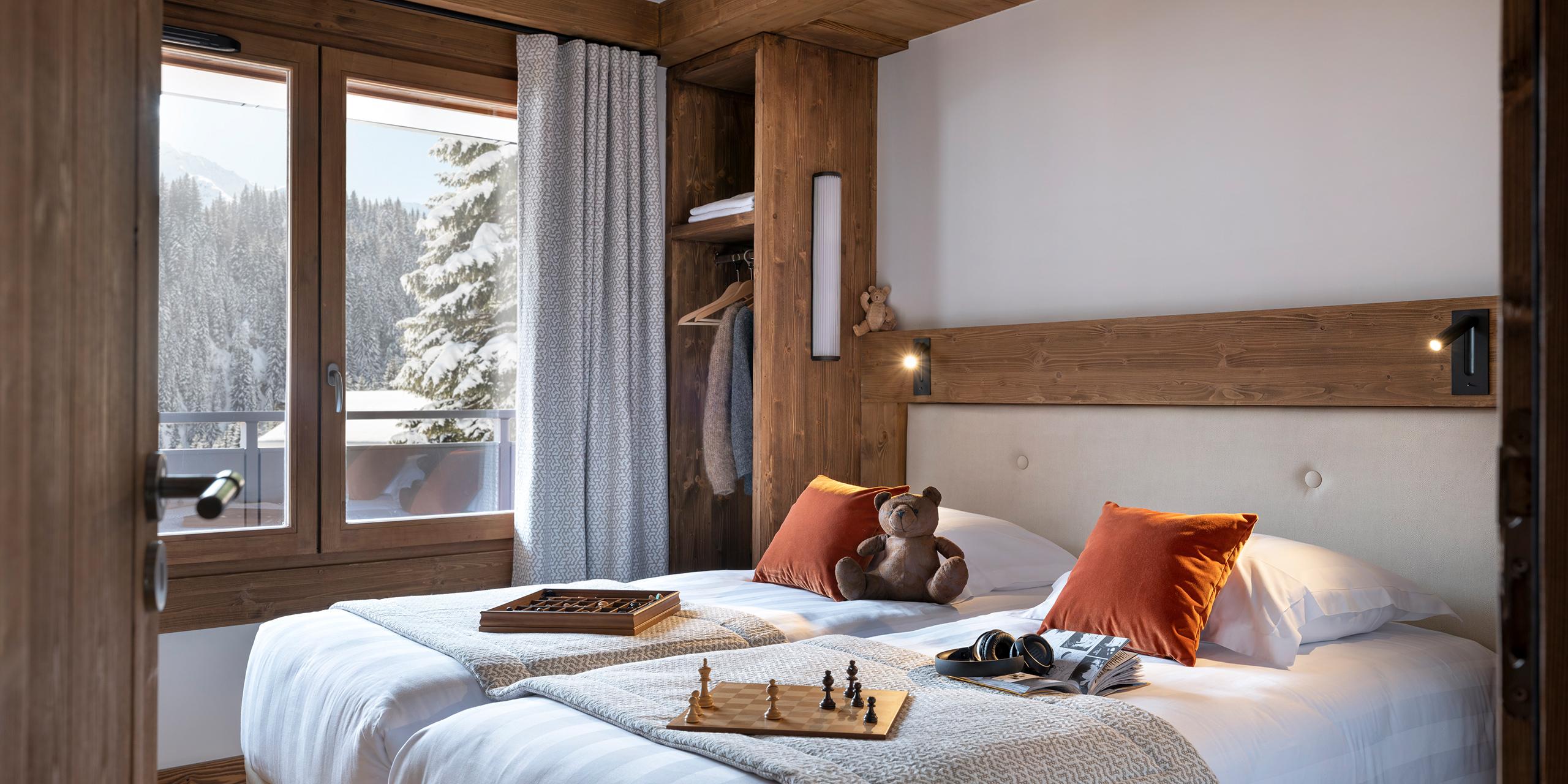 Chambre pour les enfants dans un appartement à vendre aux Chalets Láska aux Contamines Montjoie